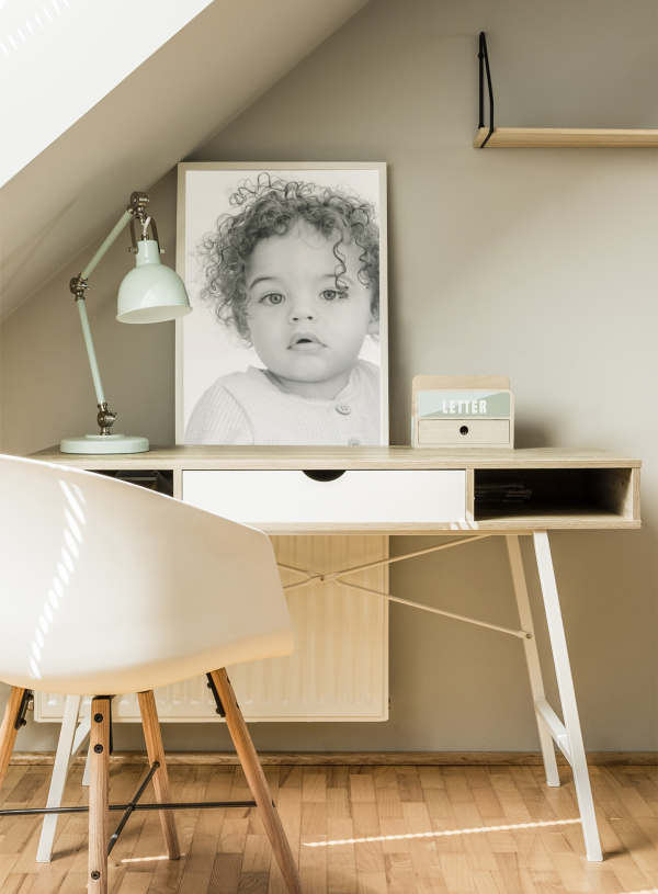 black and white photo print of a toddler with cute curly hair for baby photography