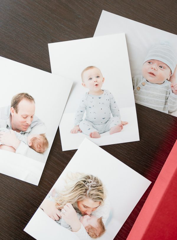 layout of printed photographs of babies for album design
